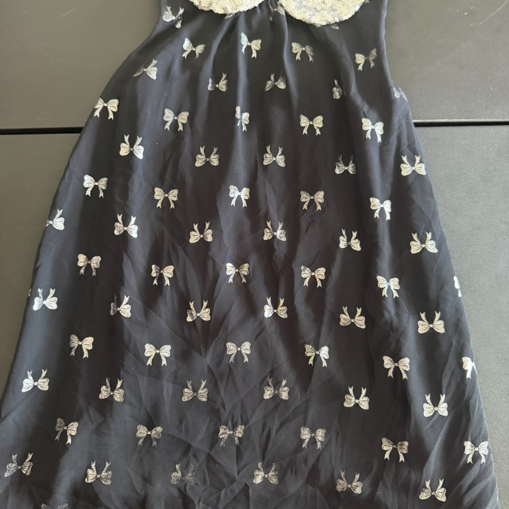 Black Dress with Silver Bow Accents